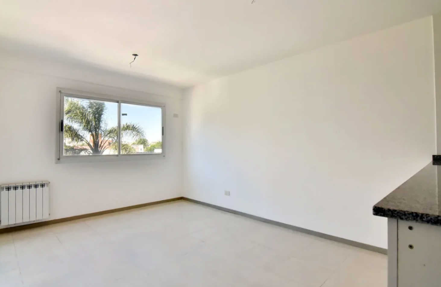 Venta departamento 3 ambientes c cochera Moron